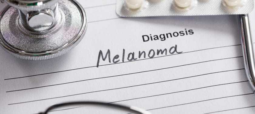 Text Melanoma On Paper Close-up Of Text Melanoma On Piece Of Paper With Stethoscope And Medicine