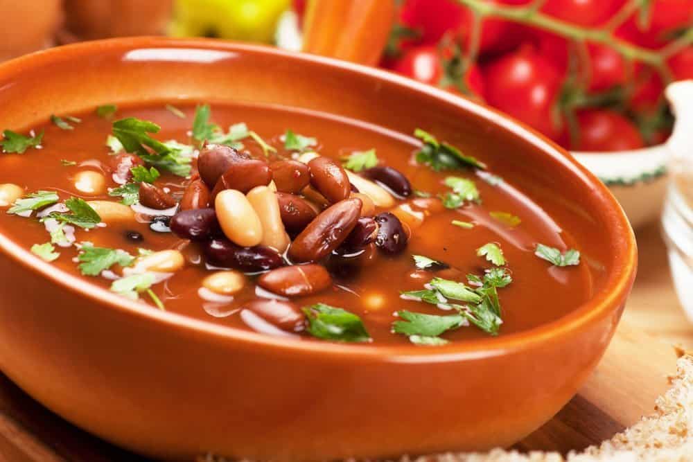 Kidney bean soup Thick kidney bean soup in rustic bowl, selective focus image