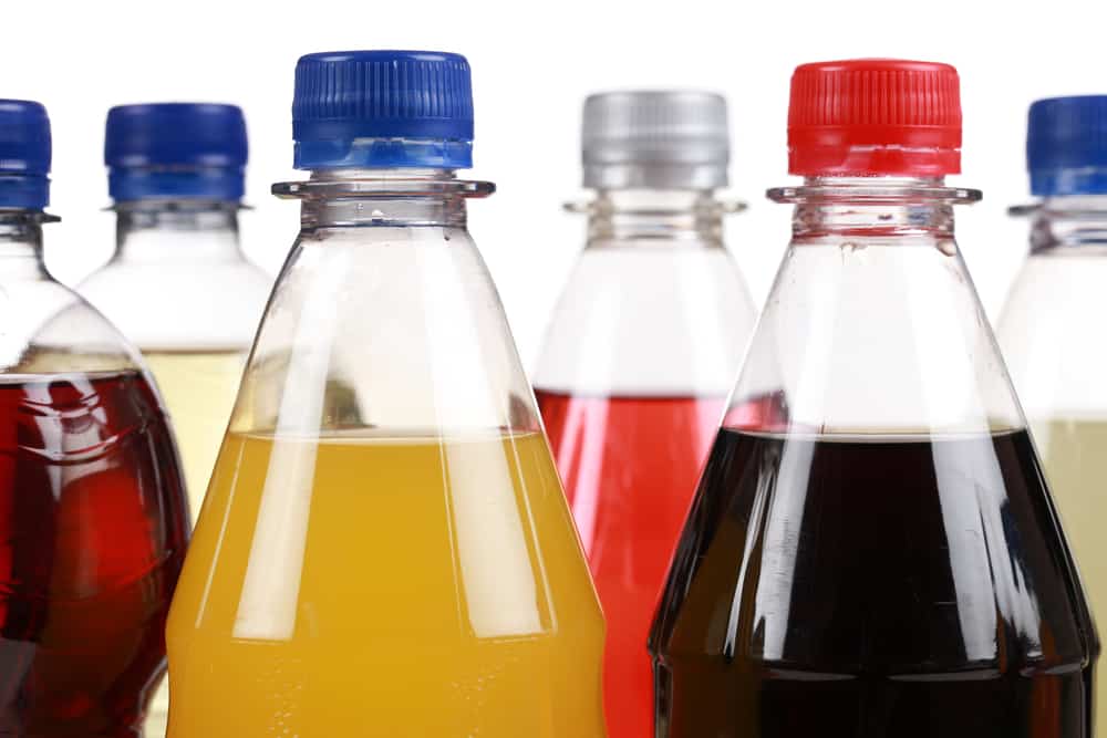 Different bottles with soda soda drinks, soft drinks