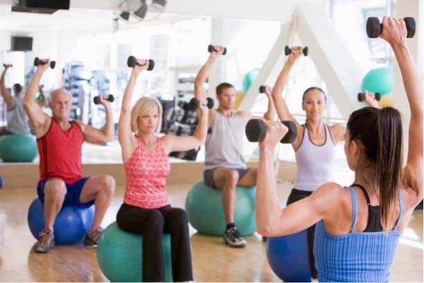 Depositphotos_4785372_s-2019-monkeybusiness adults exercising