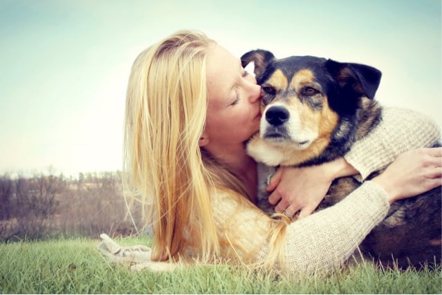 Depositphotos_47534775_s-2019.-Christin_Lolajpg woman hugging dog
