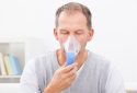 Man receiving supplemental oxygen therapy.