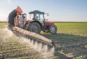 Tractor spraying pesticide.