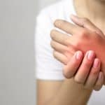 Woman experiencing peripheral nerve pain.