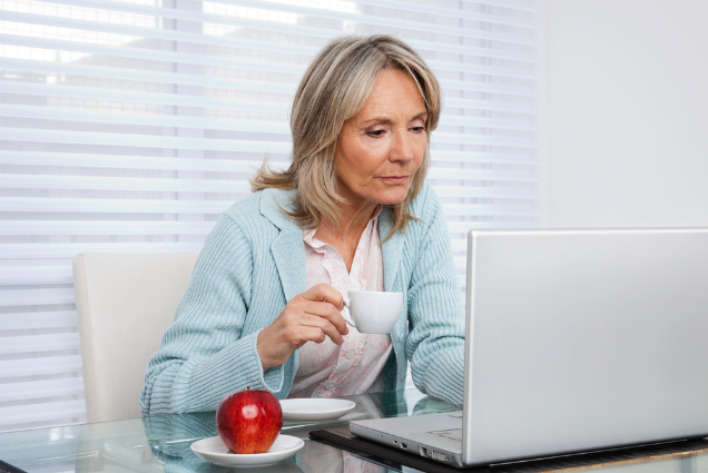 Older woman on laptop.