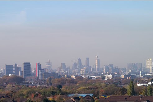 Low-lying haze over London caused by air pollution.