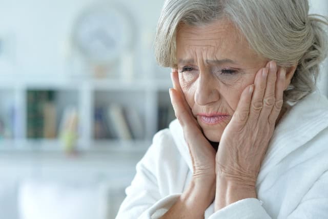 Sad older woman.